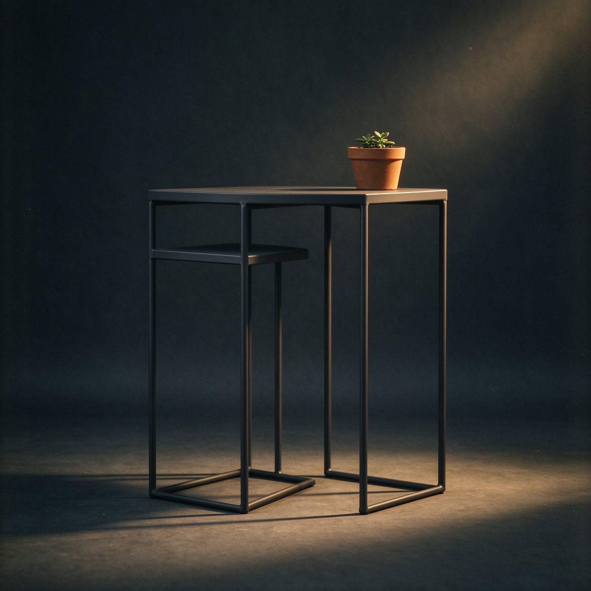Ember Side Table & Plant Stand, charcoal powder-coated steel, geometric frame, weathers well and stays put